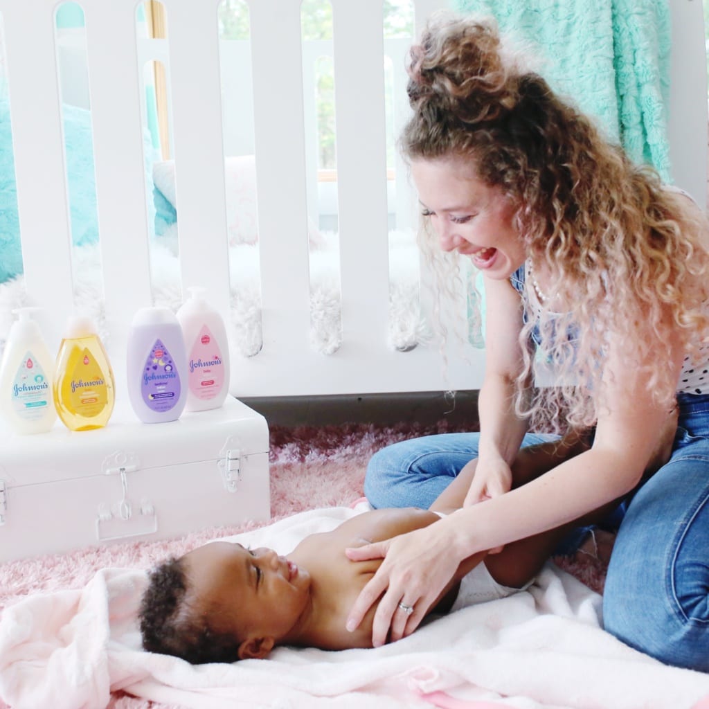 Lindsey smiling at baby Claire