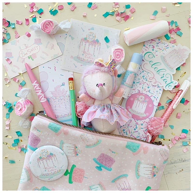 pastel pens, stickers, chaptstick, pouch and cards